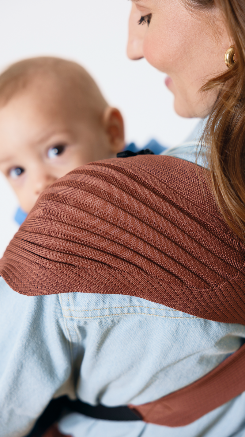 Getragene Babys weinen weniger